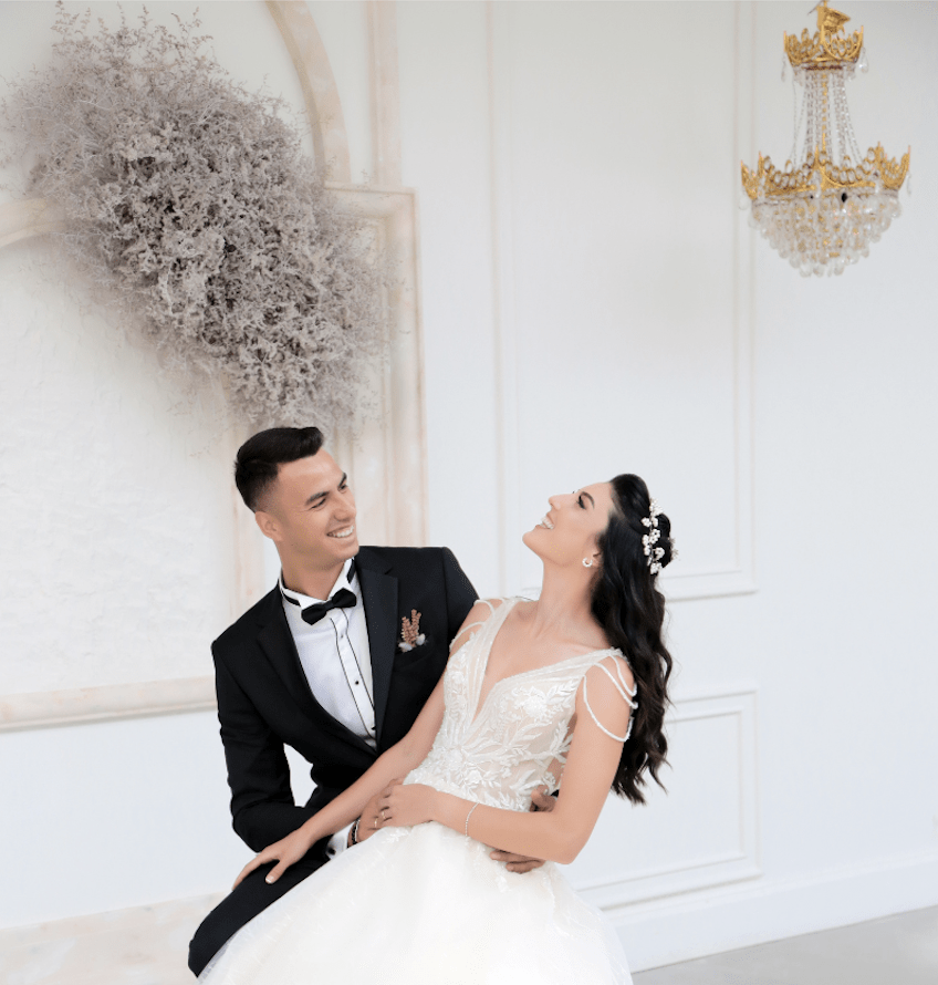 bride and groom smiling about the future